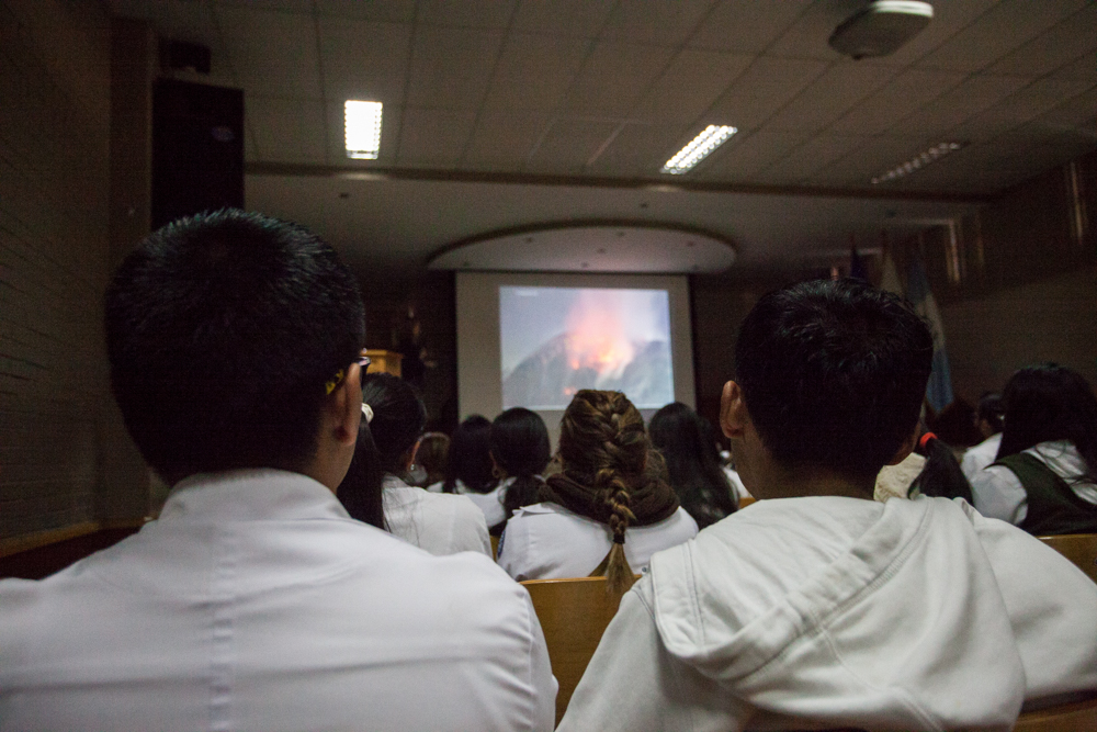 Students watching the activity at the Caliente dome in 2012 and learning how scientists use photogrammetry to measure changes in the surface of the lava dome through time.